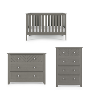 Three pieces of gray nursery furniture: Child Craft Atwood 3-in-1 Euro Convertible Crib in Lunar Gray (top), a three-drawer dresser with decorative patterns (bottom left), and a tall four-drawer chest with matching details (bottom right).