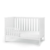 The Child Craft F09501 Toddler Guard Rail in matte white features sturdy wood construction, open side and back slats, a safety guard rail, and a sleek modern design for your toddler's bed.