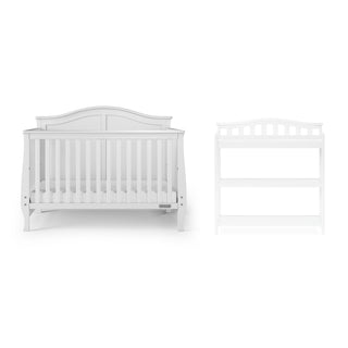 The Child Craft Camden 4-in-1 Convertible Crib in Matte White, shown with a matching white changing table against a plain white background, features slatted sides and offers a stylish, modern nursery furniture solution.