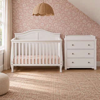 Child Craft Camden 2-Piece Nursery Set with a white convertible crib and matching three-drawer dresser with a changing table topper.