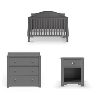 Gray nursery set by Child Craft includes the Camden 4-in-1 Convertible Crib in Cool Grey, a three-drawer dresser with round knobs, and a nightstand with a drawer and open shelf, all shown on a white background.