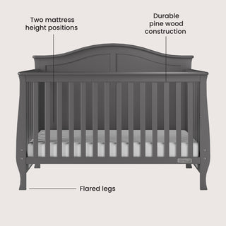 The Child Craft Camden 4-in-1 Convertible Crib in Cool Grey features vertical slats, flared legs, a curved back, 2 mattress heights, and durable pine wood. Crib adapts as your child grows. Mattress included.