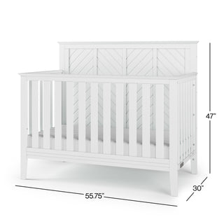 The Child Craft Atwood 4-in-1 Convertible Crib in Matte White features slatted sides and a patterned headboard. It measures 47"H x 55.75"W x 30"D and is shown empty against a white background.