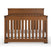 The Child Craft Redmond 4-in-1 Convertible Crib in Coach Cherry features vertical slats, a high back panel, and a white mattress, all displayed against a plain white background.