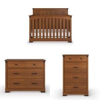 The Child Craft Redmond Full Panel 4-in-1 Convertible Crib in Coach Cherry, along with a matching dresser and tall chest, featuring black handles, are shown as ideal nursery furniture on a white background.