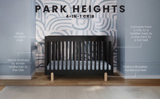 The Child Craft Park Heights 4-In-1 Euro Crib in Caviar Black, a modern Brazilian hardwood crib with wooden feet, adds artisan heirloom quality and sleek style to a mid-century nursery and converts for versatile use.