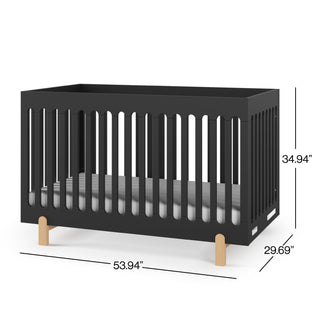 The Child Craft Park Heights 4-In-1 Euro Crib in Caviar Black features vertical slats, wooden legs, includes a mattress, and measures 53.94"L x 29.69"W x 34.94"H—perfect for a stylish, modern nursery.