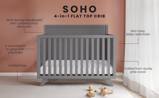 The Child Craft Soho 4-in-1 Flat Top Convertible Crib in Cool Gray features a flat top headboard, canted legs, non-toxic finish, sturdy pine wood, and multiple conversion options—perfect against a warm pink nursery wall.