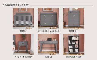 The Soho 4-in-1 Flat Top Convertible Crib in Cool Gray by Child Craft stands with other gray nursery furniture—dresser, chest, nightstand, table, and bookshelf—against a pink wall, each labeled and adorned with toys and books.