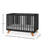 The Child Craft Soho 4-in-1 Convertible Crib in Ebony features vertical slats, angled wooden legs, a white mattress, and measures 92cm H x 138cm L x 74cm W. Easily converts into a toddler bed as your child grows.