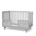 The Child Craft Toddler Guard Rail in Gentle Gray is shown on a white background, featuring open slats, low height, and a geometric-patterned mattress, inspired by classic Child Craft crib designs.