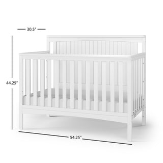 The Child Craft Scout 4-in-1 Convertible Crib in matte white features vertical slats, a solid back panel, and measures 30.5"D x 54.25"W x 44.25"H—perfect for any nursery.