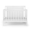 The Child Craft Scout 4-in-1 Convertible Crib in Matte White features vertical slats on all sides, a high back panel, and a simple modern design. Shown empty against a plain white background.