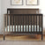 Dapper Gray Child Craft Scout 4-in-1 convertible crib with a slatted beadboard headboard and footboard.