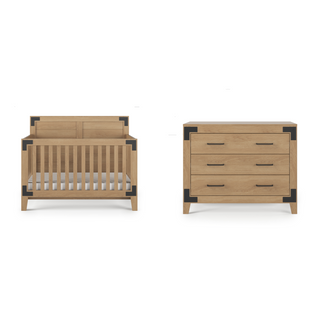 The Child Craft Lucas 4-in-1 Convertible Crib in Nutmeg features vertical slats, black metal corner accents, and angled legs, paired with a matching dresser—all shown against a white background.