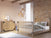 A cozy bedroom with exposed brick walls features the Child Craft Lucas 4-in-1 Convertible Crib in Nutmeg, matching dresser, pendant lights, a rug, and soft natural light streaming through sheer curtains.