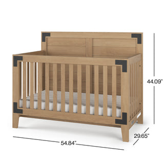 The Child Craft Lucas 4-in-1 Convertible Crib in Nutmeg features black metal corner accents, slatted sides, a solid headboard, and measures 54.84" W x 29.65" D x 44.09" H.
