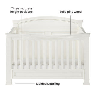 The Child Craft Westgate 4-in-1 Convertible Crib in Vintage Linen features solid pine construction, slatted sides, an arched back panel with elegant trim, adjustable mattress support, and molded details for a timeless look.
