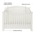 The Child Craft Westgate 4-in-1 Convertible Crib in Vintage Linen features solid pine construction, slatted sides, an arched back panel with elegant trim, adjustable mattress support, and molded details for a timeless look.