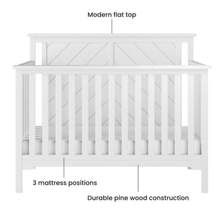 The Child Craft Hampton Flat Top 4-in-1 Convertible Crib in Matte White features a modern flat top, three mattress positions, and sturdy pine wood construction with non-toxic finishes, shown front-facing with labeled features.