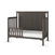 The Child Craft Hampton Flat Top 4-in-1 Convertible Crib in Dapper Gray features a partial safety rail, vertical slat ends, a solid chevron-patterned headboard, and comes with a white mattress, shown without bedding.