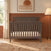 Dapper Gray Child Craft Hampton Flat Top 4-in-1 Convertible Crib featuring a flat top and X-patterned headboard.