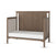 The Child Craft Hampton Flat Top 4-in-1 Convertible Crib in Dusty Heather features vertical side slats, an open side, a chevron-patterned headboard, and a white mattress, all crafted in a classic pine wood style.
