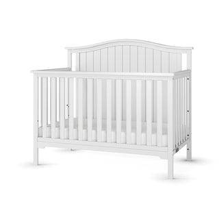 The Child Craft Hampton Arch Top 4-in-1 Convertible Crib in matte white features a high curved headboard, vertical slats, adjustable mattress support, and a simple modern design. Shown empty against a plain white background.