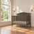 Dapper Grey Hampton Arch Top 4-in-1 Convertible Crib with an arched headboard.