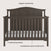 The Child Craft Hampton Arch Top 4-in-1 Convertible Crib in Dapper Grey features an elegant arched top, adjustable mattress support, and durable construction. Shown with a white mattress inside.