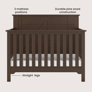 Front view of the Child Craft Woodland 4-in-1 Convertible Crib in Brushed Truffle, featuring straight legs, adjustable mattress support with 3 positions, and a white mattress inside this durable pine wood crib.