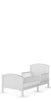 The Child Craft Hampton Toddler Bed in Matte White features a paneled headboard and footboard, sturdy guard rails for safety, and a low-to-the-ground design for easy access, shown on a plain white background.