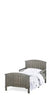 The Child Craft Hampton Toddler Bed in Dapper Gray features a slatted headboard and footboard, fits a standard crib mattress, and is shown with a white and gray patterned comforter and pillow.