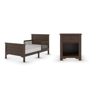 The Child Craft Woodland Toddler Bed in Brushed Truffle features a dark brown, modern design with slatted headboard and footboard. Shown beside a matching nightstand with one drawer and open shelf, both offer clean, simple style.