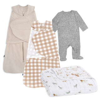 HALO Fall/Winter Swaddle Bundle featuring neutral and brown sleep sacks, a gray long-sleeve onesie, a bamboo brown-and-white checked swaddle, and an organic animal-print dream blanket—all displayed on a white background.