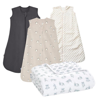 The HALO Fall/Winter SleepSack Wearable Blanket Bundle features three cozy blankets in dark gray, sheep-print beige, and textured off-white, plus two folded organic dream blankets with gray animal prints—ideal for chilly nights.