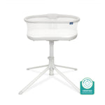 The HALO BassiNest Swivel Sleeper 3.0 is a white bedside bassinet with mesh sides on a raised stand with four splayed legs, ensuring safe baby sleep. A Baby Safety Alliance Verified badge appears in the bottom right corner.