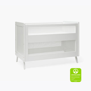 The HALO 3-in-1 Convertible Full Size Breathable Mesh Crib features a modern white design with clean lines, slightly angled legs, and breathable mesh. A green GREENGUARD Gold badge highlights its certified safety.