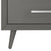 Close-up of the Child Craft Cranbrook 4 Drawer Chest in Lunar Gray, showcasing a tapered leg and horizontal silver drawer handle. This modern, minimalist piece is perfect as nursery furniture or a mid-century modern dresser.