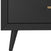 Close-up of the Child Craft Cranbrook 4-Drawer Chest - Ebony highlights its gold rectangular handle and tapered legs, offering a modern, minimalist look influenced by classic Mid-Century Modern dresser design.