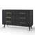The Child Craft Cranbrook Double Dresser, Ebony, is a modern black Mid-Century Modern dresser with six drawers, gold handles, and angled legs—ideal nursery furniture against a white background.