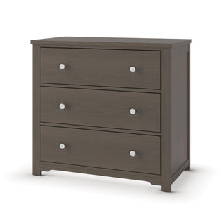 The Child Craft Harmony 3-Drawer Dresser with Changing Table Topper in Dapper Gray is perfect nursery furniture, featuring a sleek design and spacious drawers for children's essentials, shown against a white background.