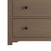 A close-up of the Child Craft Harmony 3-Drawer Dresser with Changing Table Topper in Dusty Heather shows two drawers with round black knobs, a light brown finish, and short square legs—perfect for nursery storage or pairing with the included topper.