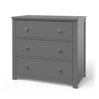 The Child Craft Harmony 3-Drawer Dresser with Changing Table Topper in Cool Gray features a simple design and round metal knobs. Ideal for nursery storage, this kids dresser is shown on a white background.