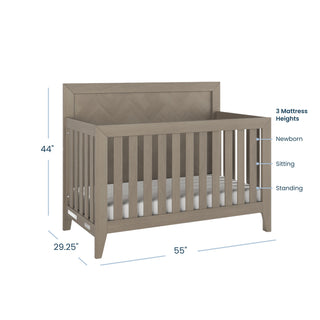 Introducing the Child Craft Kieran 3 Piece Nursery Set with Crib, Dresser, and Chest—a versatile staple for any nursery. The set features a convertible wooden crib measuring 44" high, 29.25" deep, and 55" wide, with side labels indicating three adjustable mattress heights for newborns, sitters, and standers. The crib’s slatted design paired with a solid headboard ensures both safety and modern style. Complete your space by pairing the crib with the matching dresser and chest included in the set.
