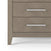 Close-up of the Child Craft Kieran 6-Drawer Double Dresser in Crescent Gray, featuring a herringbone pattern, sleek silver handles, and angled legs—ideal for a nursery—shown against a white background.