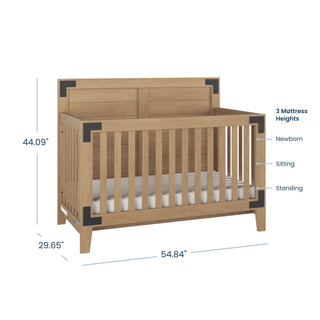 The Child Craft Lucas 2-Piece Crib and DreamWeave Set in Nutmeg features black corner accents, three mattress heights, and measures 44.09"H x 29.65"D x 54.84"W. Includes a breathable crib mattress for extra comfort.