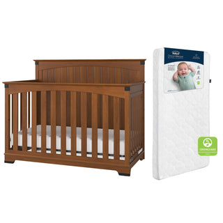 The Child Craft Redmond Full Panel 2-Piece Crib and DreamWeave Set in Coach Cherry includes a crib with vertical slats and an arched headboard plus a breathable, Greenguard-certified mattress with baby image packaging.