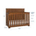 The Child Craft Redmond 4 Piece Nursery Set includes a convertible crib with slatted sides, curved headboard (45