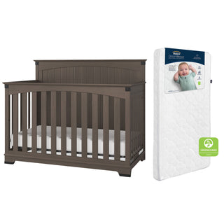 The Child Craft Redmond 2-Piece Crib and DreamWeave Set in Dapper Grey features a convertible crib with vertical slats and a white HALO DreamWeave breathable mattress with GREENGUARD certification and smiling baby packaging.